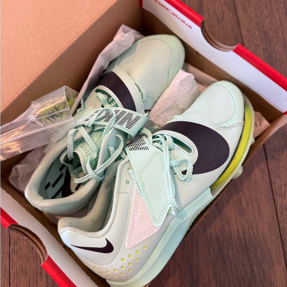 Brand New Nike Kids Track Light Mint Spikes with Dark Teal Swoosh